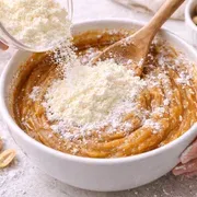 Milchpulver einarbeiten